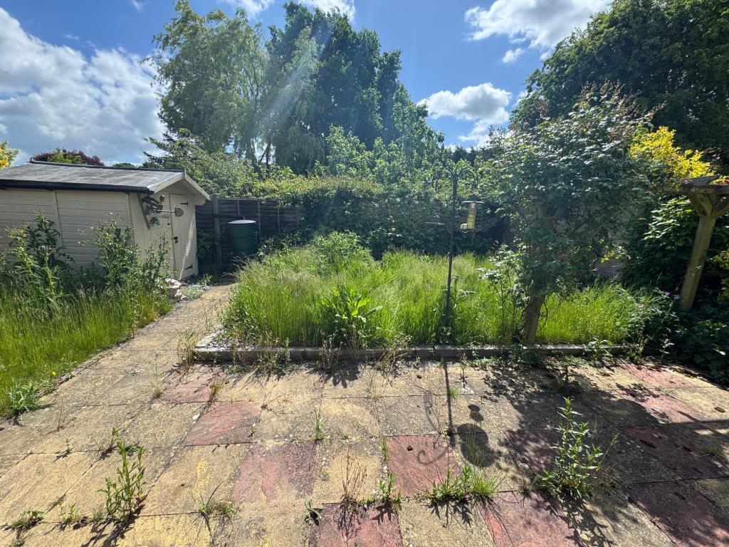 Lot: 142 - TWO-BEDROOM SEMI-DETACHED BUNGALOW WITH GARAGE - Rear garden